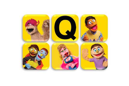 Set of six colorful buttons featuring various characters with a large black 'Q' in the center.